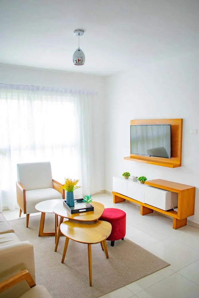 Living room, TV and lounge furniture in an apartment at Beach Apartamentos in Playa Palmera 